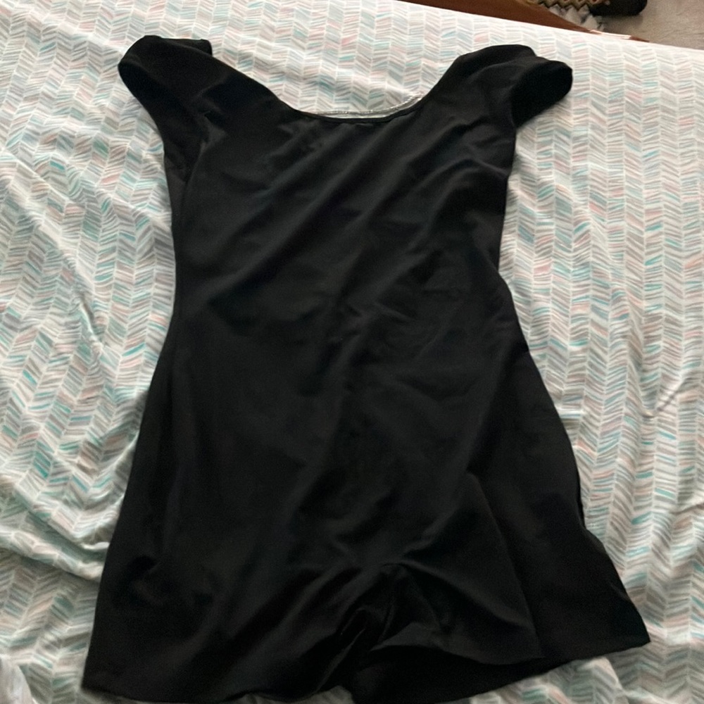 Black short jumpsuit with chain